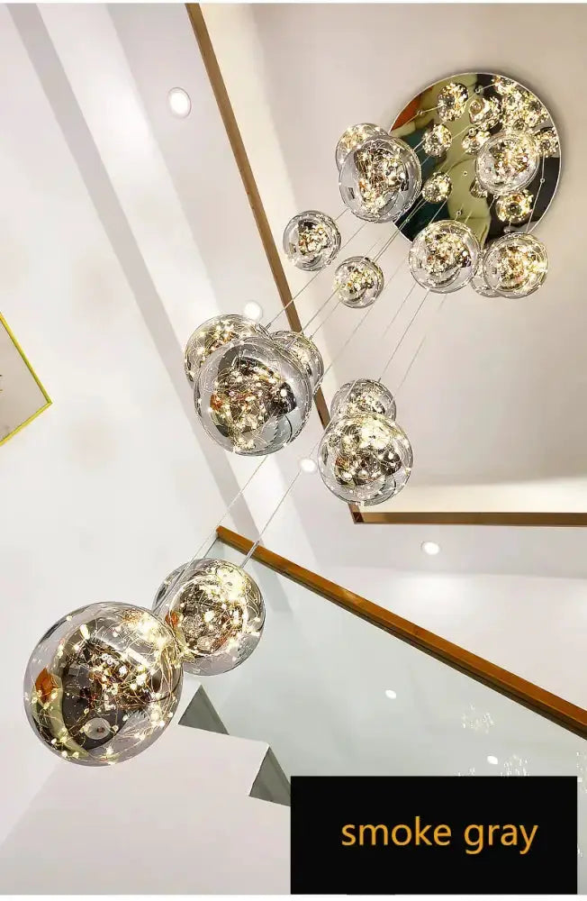 Decorbites modern spiral crystal ball chandelier for dining room with smoke gray glass spheres on Tampa Home & Garden Store