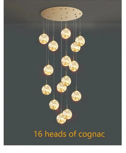 Modern spiral crystal ball chandelier by Decorbites with 16 gold crystal orbs for dining room on Tampa Home & Garden Store