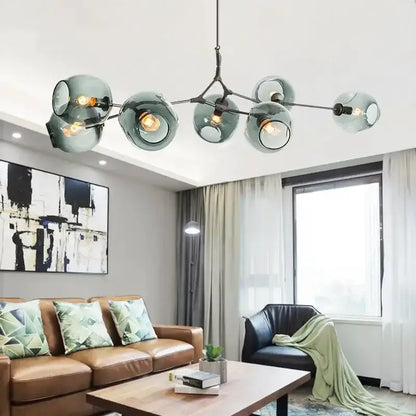 Chandelier Decorbites teal glass bubble eight-globe chandelier hanging in living room on Tampa Home & Garden Store