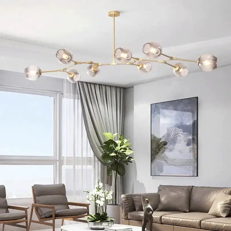 Chandelier Decorbites eight-globe teal glass bubble chandelier with brass finish on Tampa Home & Garden Store