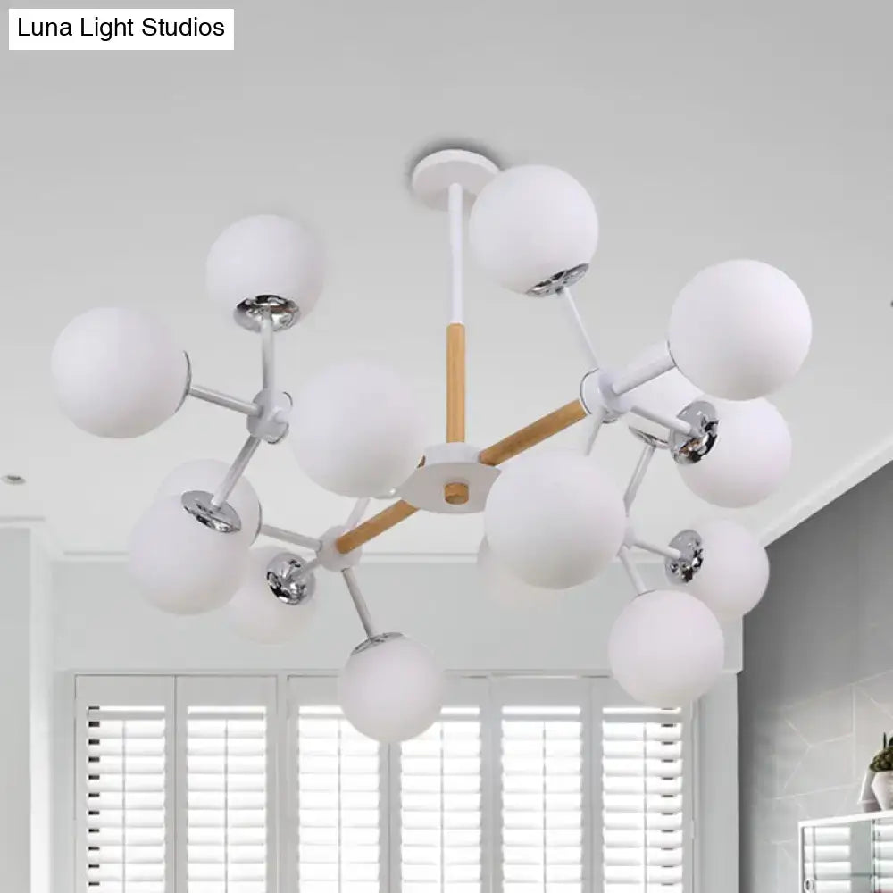 White Globe Chandelier by Decorbites, spherical fixture with chrome arms and wooden accents on Tampa Home & Garden Store
