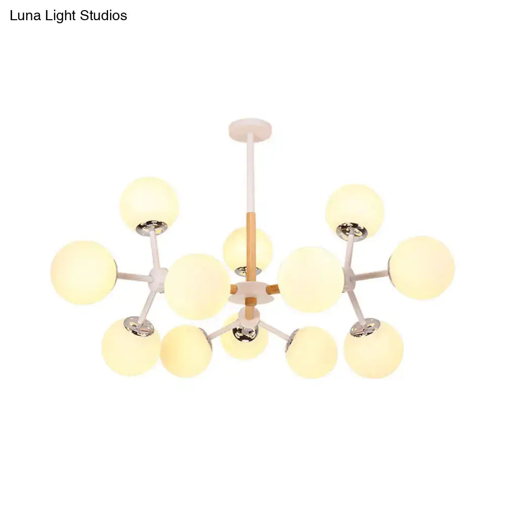 White Globe Chandelier by Decorbites with multiple frosted glass spheres on a white frame on Tampa Home & Garden Store