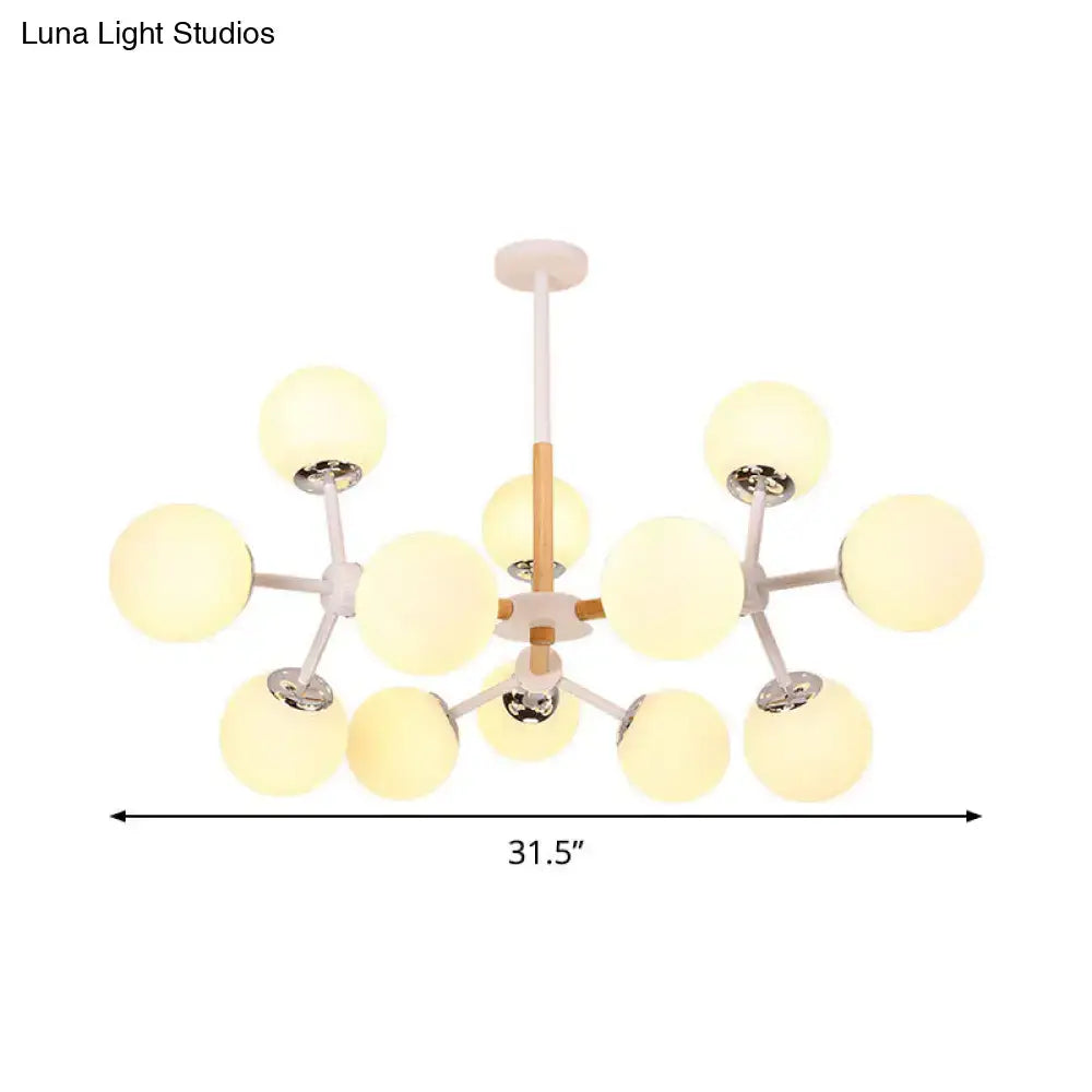 White Globe Chandelier by Decorbites with frosted glass globes on white arms 31.5 in wide on Tampa Home & Garden Store
