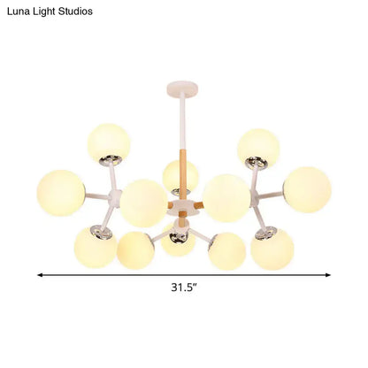 White Globe Chandelier by Decorbites with frosted glass globes on white arms 31.5 in wide on Tampa Home & Garden Store