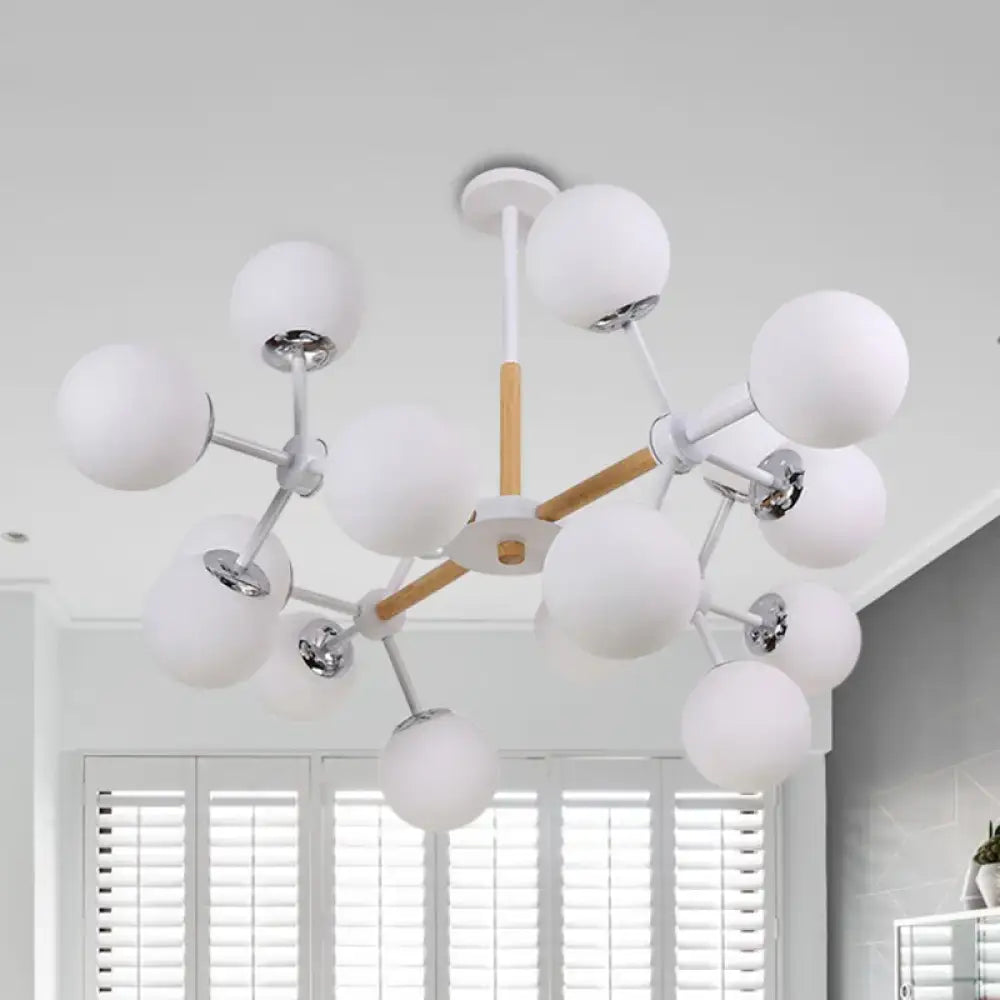 Decorbites White Globe Chandelier with white globe bulbs and metal arms on Tampa Home & Garden Store