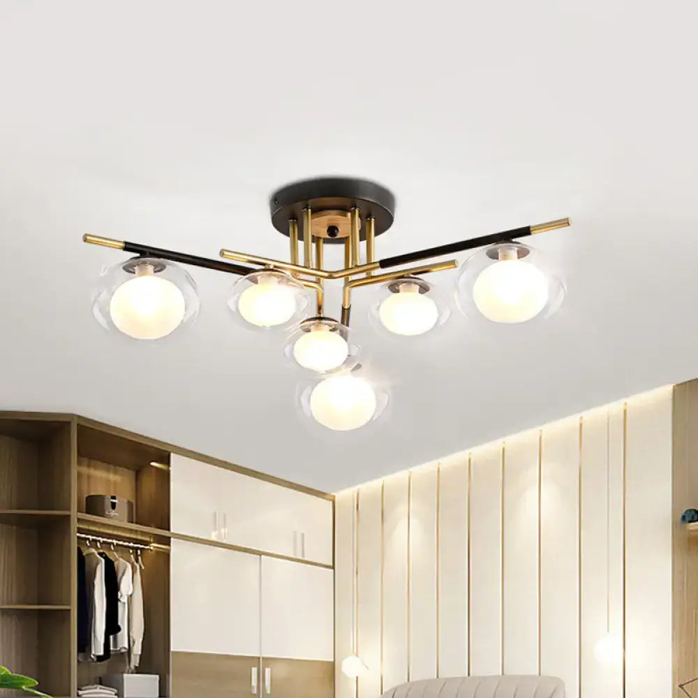 Gold oval glass light fixture by Decorbites with brass arms and clear glass globes on Tampa Home & Garden Store