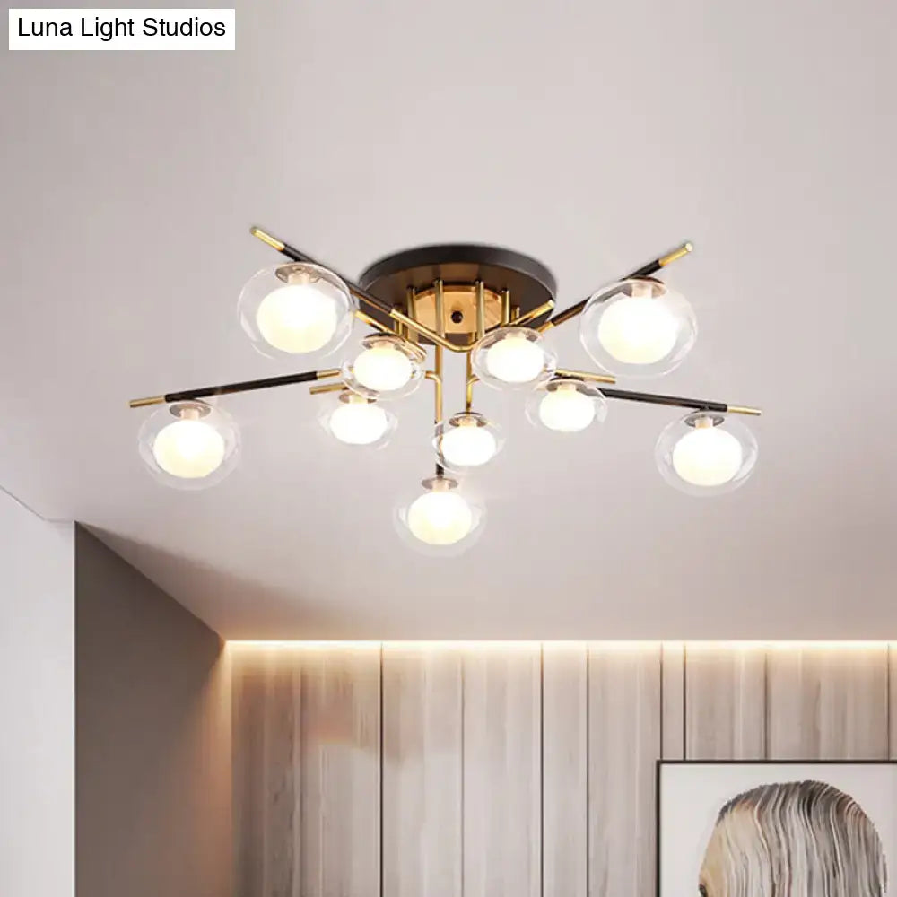 Gold Oval Glass Light fixture by Decorbites with brass arms and nine glass globes on Tampa Home & Garden Store