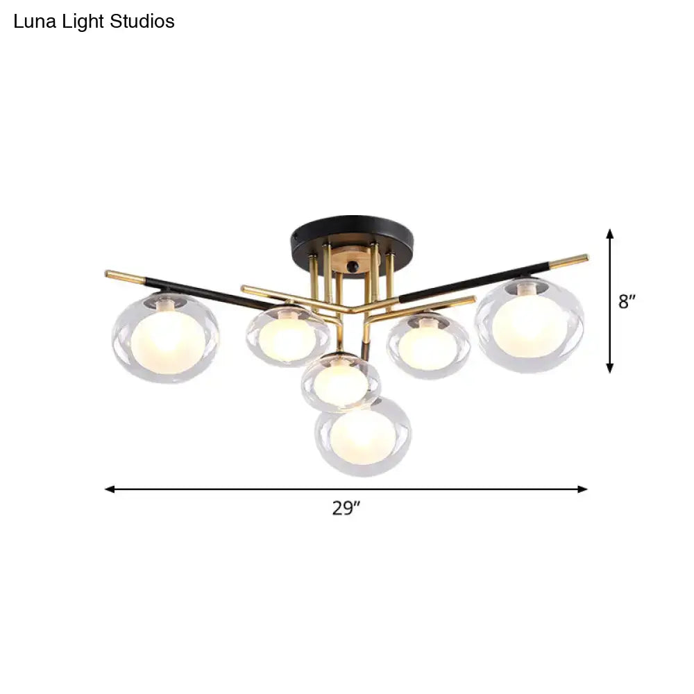 Gold Oval Glass Light by Decorbites; six clear glass globes on a gold brass-tone frame on Tampa Home & Garden Store