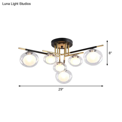 Gold Oval Glass Light by Decorbites; six clear glass globes on a gold brass-tone frame on Tampa Home & Garden Store