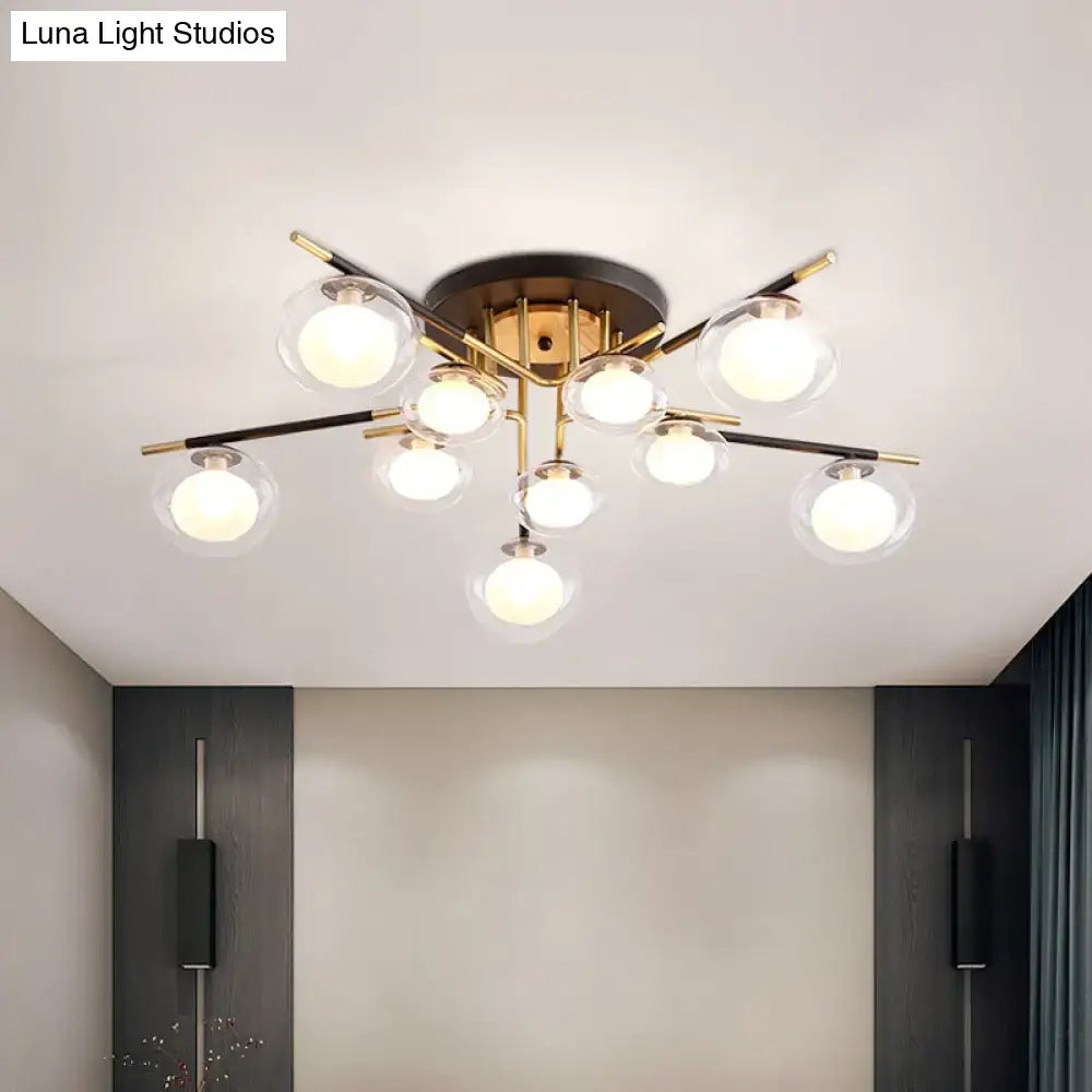 Gold oval glass light fixture by Decorbites, brass gold arms and clear globe bulbs on Tampa Home & Garden Store
