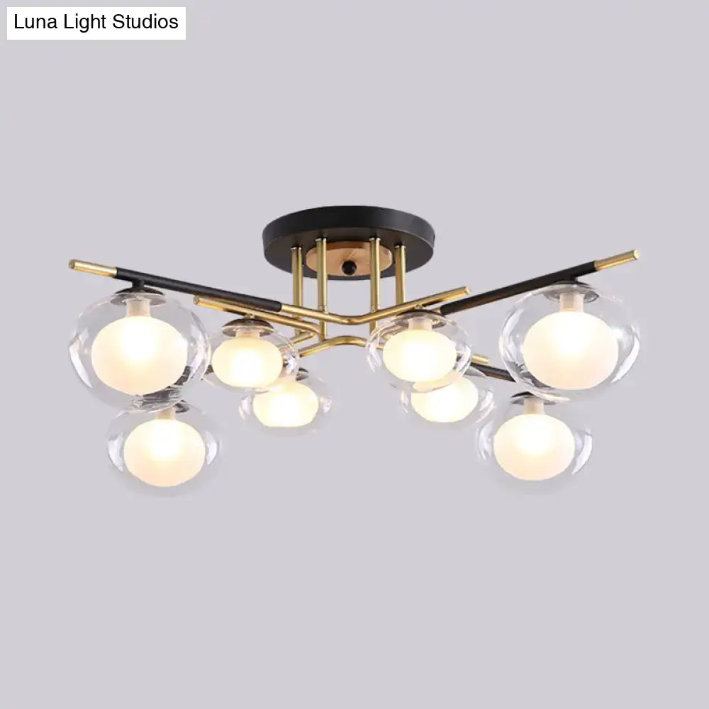 Gold Oval Glass Light ceiling chandelier by Decorbites with black and brass arms and glass globes on Tampa Home & Garden Store