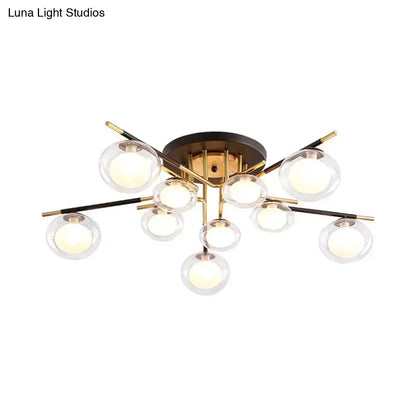 Decorbites Gold Oval Glass Light fixture with nine clear glass globes and brass arms on Tampa Home & Garden Store