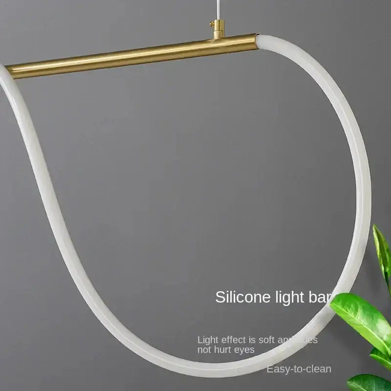 Decorbites modern gold circular LED pendant chandelier with white silicone light ring on Tampa Home & Garden Store