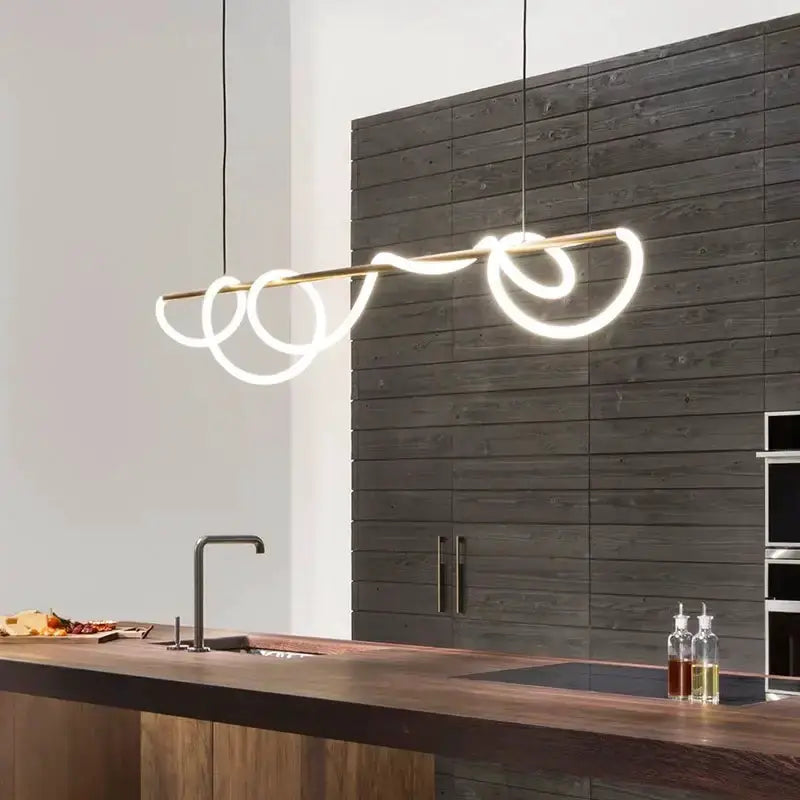 Modern gold curved contemporary LED chandelier pendant by Decorbites for dining room on Tampa Home & Garden Store
