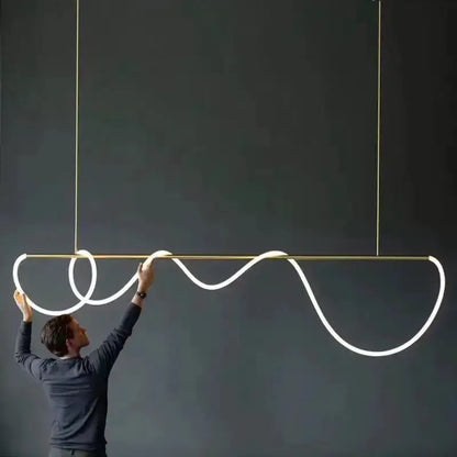 Modern gold curved LED chandelier pendant light with looping LED ribbons by Decorbites on Tampa Home & Garden Store
