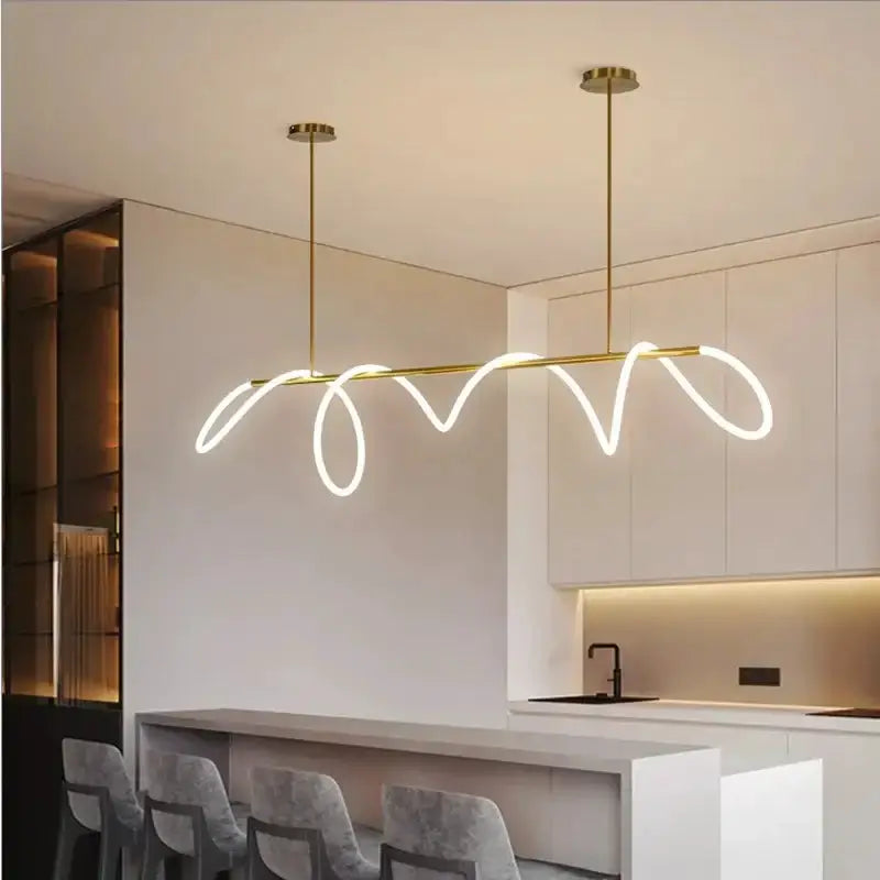 Modern gold curved LED chandelier by Decorbites for dining room on Tampa Home & Garden Store