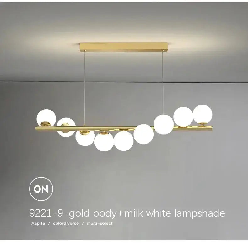Modern gold long ceiling chandelier with milk white glass globes on a gold bar Decorbites on Tampa Home & Garden Store