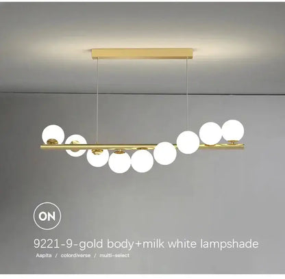 Modern gold long ceiling chandelier with milk white glass globes on a gold bar Decorbites on Tampa Home & Garden Store