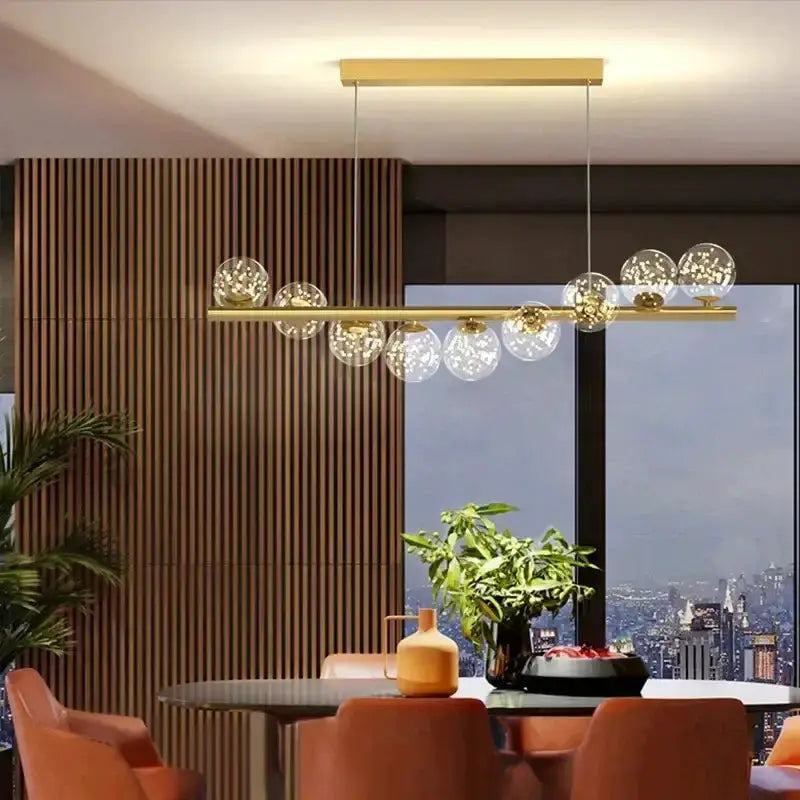 Chandelier Decorbites modern gold long ceiling glass pendant light with globe bulbs over dining table on Tampa Home & Garden Store