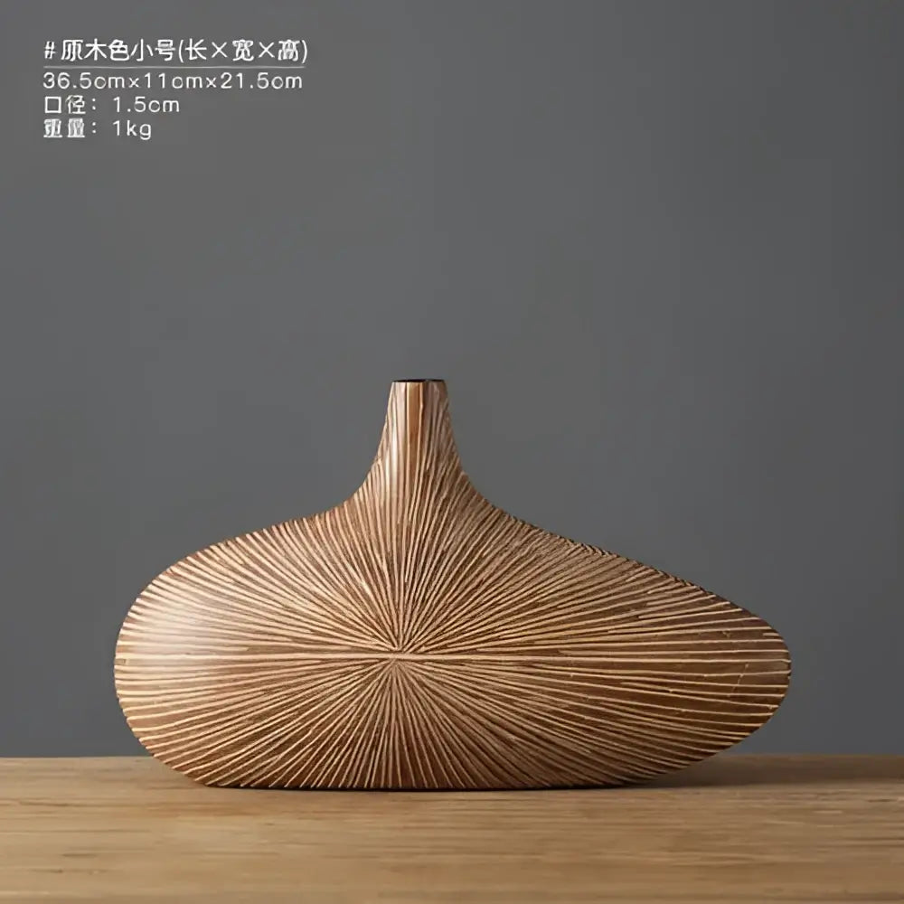 Light brown resin vase by Decorbites ribbed sunburst texture wide oval body with slim neck on Tampa Home & Garden Store