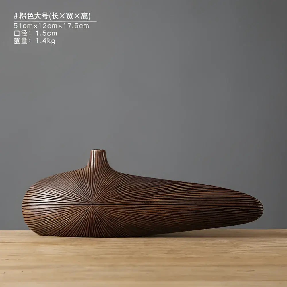 Light Brown Resin Vase by Decorbites, elongated teardrop form with radial line texture on Tampa Home & Garden Store