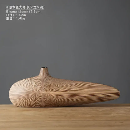 Light Brown Resin Vase by Decorbites, elongated gourd form with radiating stripe texture on Tampa Home & Garden Store