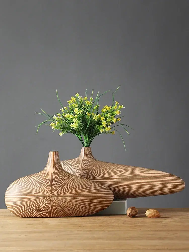 Light brown resin vase by Decorbites with ribbed texture and narrow neck, yellow bouquet on Tampa Home & Garden Store
