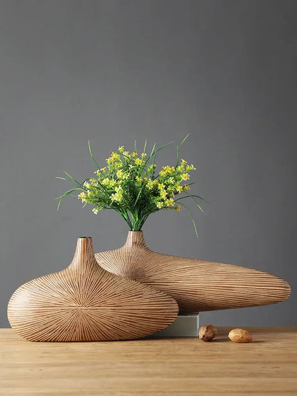 Light brown resin vase by Decorbites with ribbed texture and narrow neck, yellow bouquet on Tampa Home & Garden Store