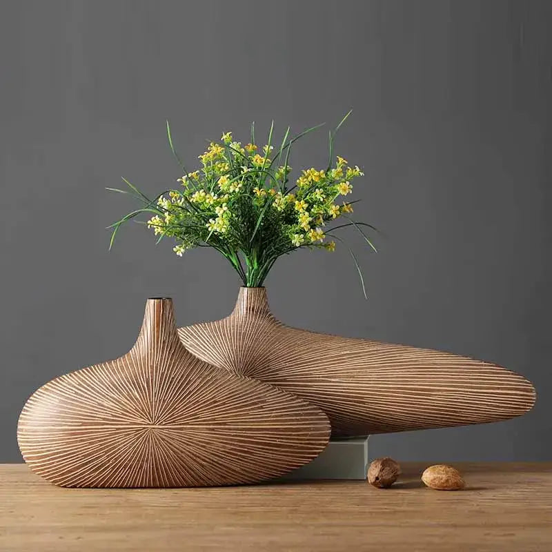 Light brown resin vases pair with radial texture by Decorbites on Tampa Home & Garden Store