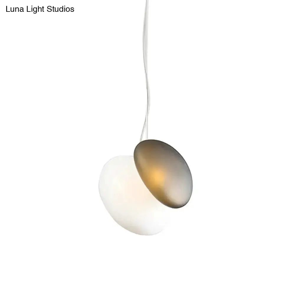 Modern cream white glass stacked pendant light by Decorbites with overlapping discs on Tampa Home & Garden Store