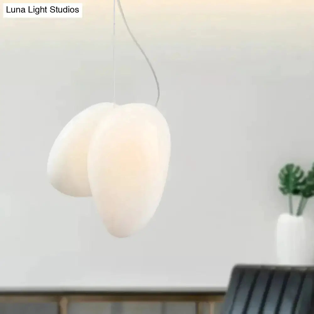 Modern cream white glass stacked pendant lights pair by Decorbites for dining room lighting on Tampa Home & Garden Store