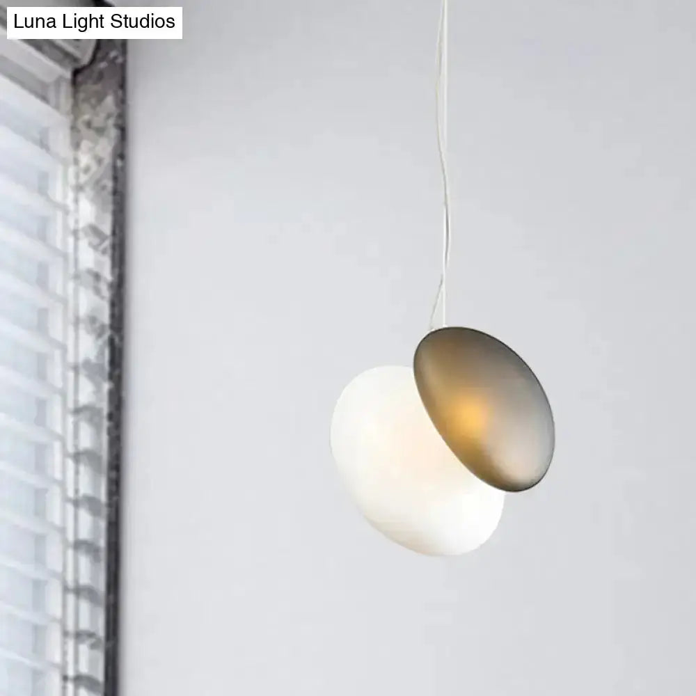 Modern cream white glass stacked pendant light with two overlapping discs by Decorbites on Tampa Home & Garden Store