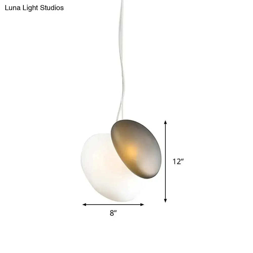 Modern cream white glass stacked pendant light with bronze disc corded fixture Decorbites on Tampa Home & Garden Store