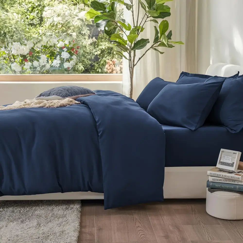 Decorbites Black Satin Duvet Set on navy blue satin duvet cover with coordinating pillow shams on Tampa Home & Garden Store
