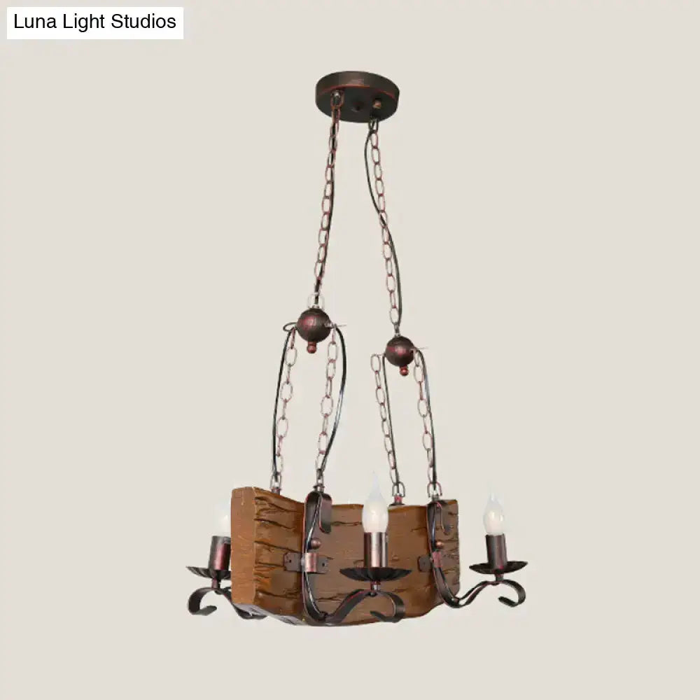 Rustic bronze island chandelier with wooden centerpiece and chain hangers, 3 candle bulbs on Tampa Home & Garden Store