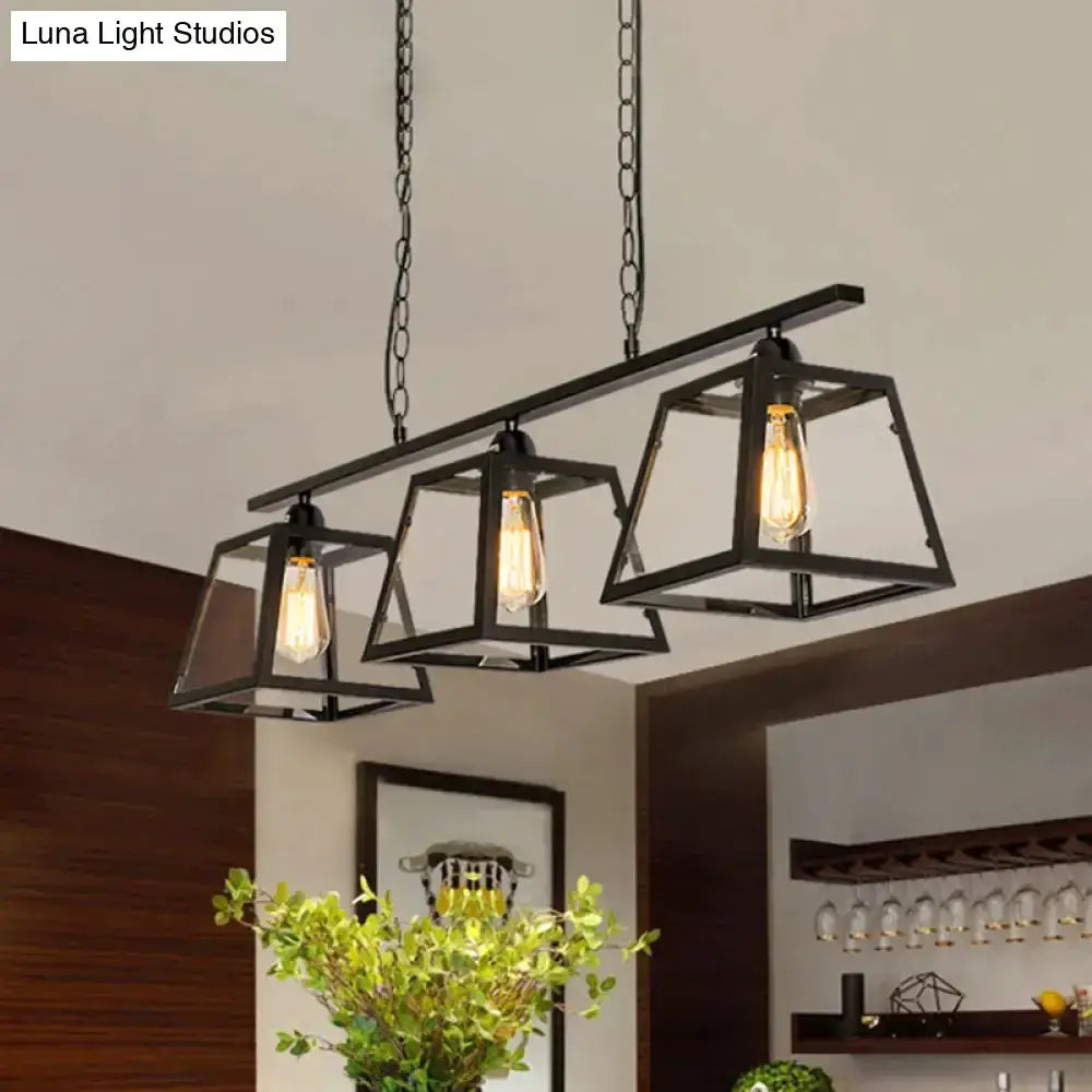 Industrial black metal island pendant lights with glass lanterns, triple-frame design on Tampa Home & Garden Store