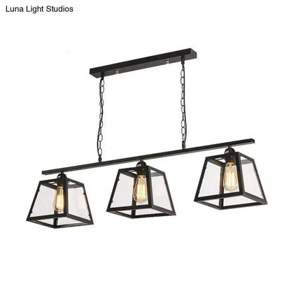 Industrial black metal island pendant light Decorbites with three glass lanterns on Tampa Home & Garden Store