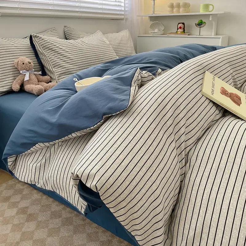 Blue duvet cover set by Decorbites 1pc with striped beige accents on bed on Tampa Home & Garden Store