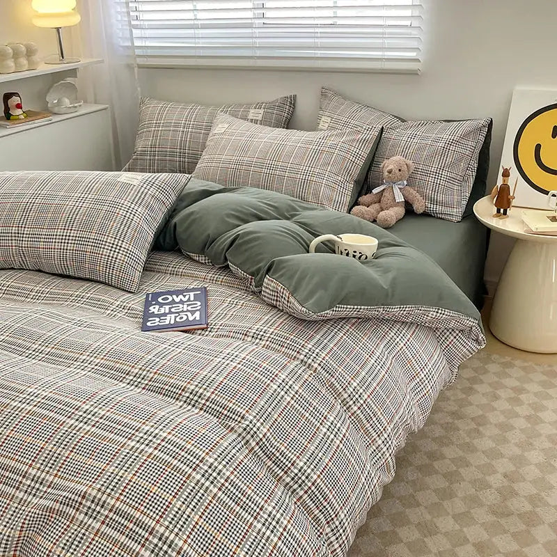 Nordic plaid muted green 1pc duvet cover set by Decorbites on bed with plaid pillowcases on Tampa Home & Garden Store