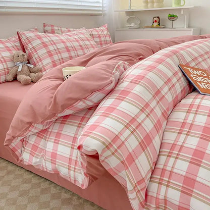 Decorbites pink plaid duvet cover set with matching pillowcases on bed on Tampa Home & Garden Store