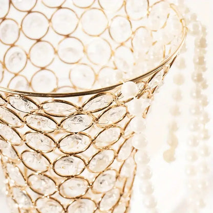 Gold crystal encrusted vase with gold lattice of circular crystals and hanging bead strands on Tampa Home & Garden Store