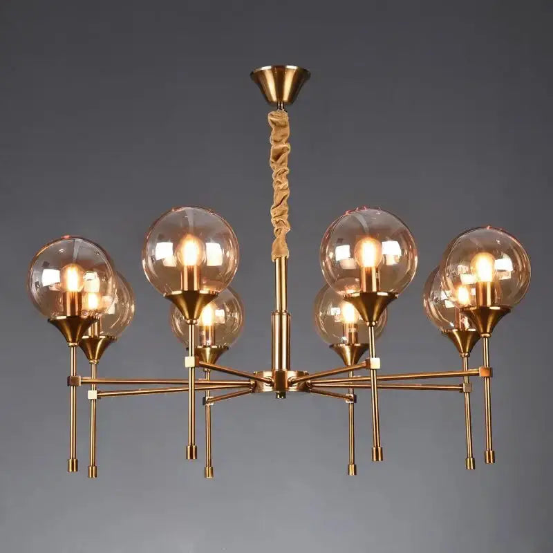 Chandelier by Decorbites: brass fixture with smoked glass globes, modern design on Tampa Home & Garden Store
