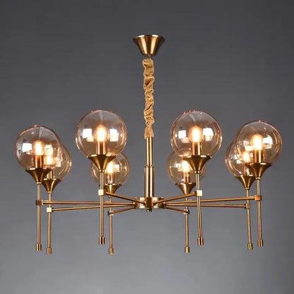 Chandelier by Decorbites: brass fixture with smoked glass globes, modern design on Tampa Home & Garden Store