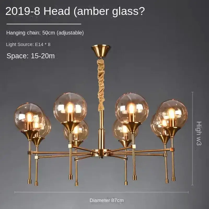 Chandelier brass metal fixture with smoked amber glass globes, modern living room decor on Tampa Home & Garden Store