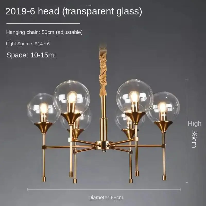 Chandelier Decorbites six-globe brass design with smoked glass globes on Tampa Home & Garden Store