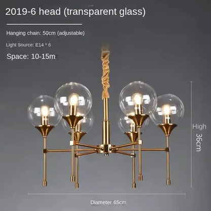 Chandelier Decorbites six-globe brass design with smoked glass globes on Tampa Home & Garden Store