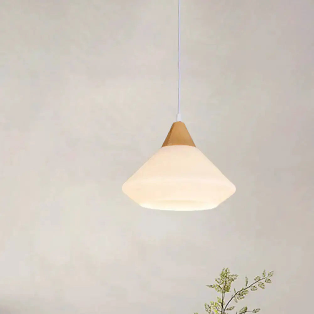 Modernist diamond white glass and wood pendant light hanging from ceiling on Tampa Home & Garden Store