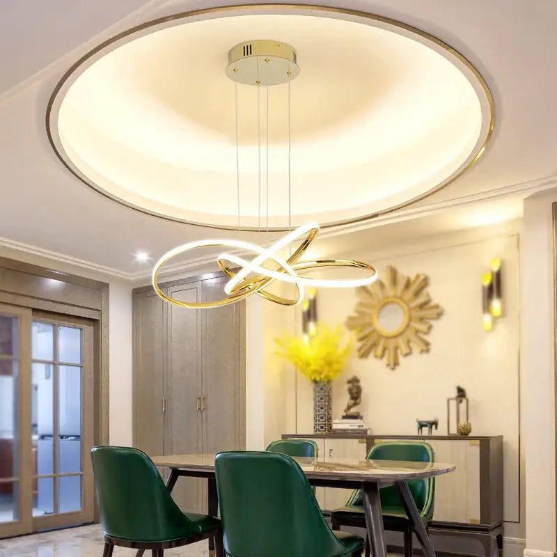 Gold Ring Chandelier Dimmable by Decorbites with intertwined gold rings over a dining table on Tampa Home & Garden Store