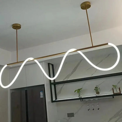Gold Nordic ceiling chandelier with brass finish and curved LED tube by Decorbites on Tampa Home & Garden Store