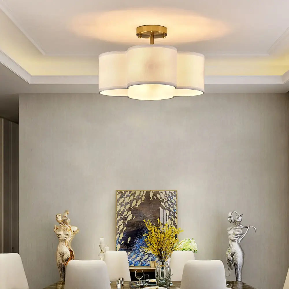 Gold 4-Light Ceiling Fixture by Decorbites, a flush mount ceiling light with white fabric shades on Tampa Home & Garden Store